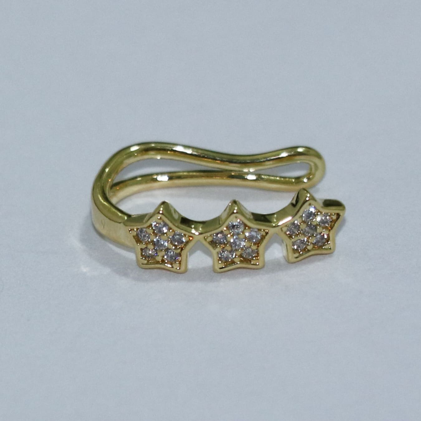 BRINCO FAKE TRÊS ESTRELINHAS COM ZIRCONIA